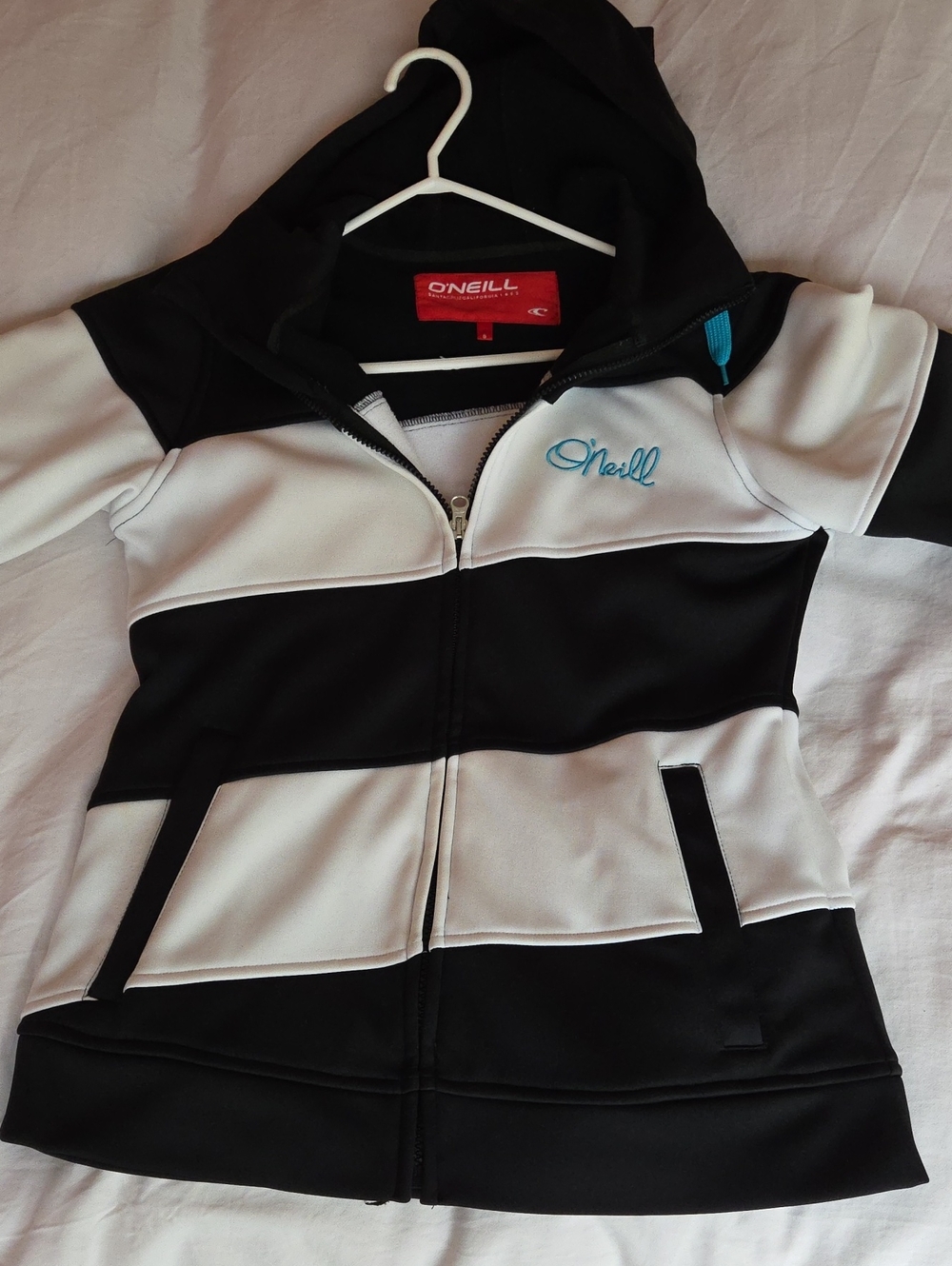 Striking Black And White oneil hoodie. Women's Small